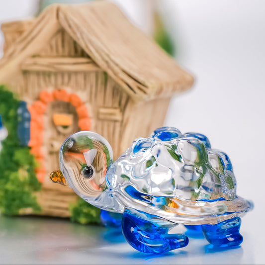 Decorative nativity scene with a focus on a small figurine of a donkey.